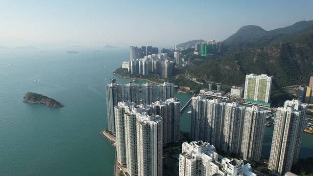 Aerial Drone fly over Ap Lei Chau, Pok Fu Lam, Aberdeen and Wong Chuk Hang, Hong Kong ,China ,Asia, a residential area with factory buildings. There are fishermen living the lives of traditional float