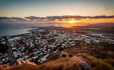 A panorama view of the city of Townsville in the sunrise from the Castle Hill Lookout