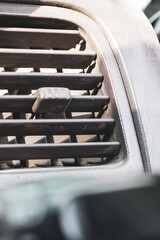 car ventilation grill close-up, stove heater problem in winter, foreground and background blurred...