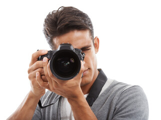 Photographer, man and camera in studio for digital photoshoot, creative production and content creation on white background. Journalist, cameraman and multimedia artist click lens for photography