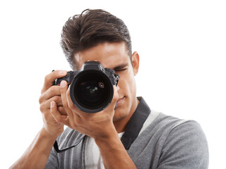 Fototapeta premium Photographer, man and camera in studio for digital photoshoot, creative production and content creation on white background. Journalist, cameraman and multimedia artist click lens for photography