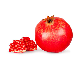 Pomegranate fruit and slices isolated on a white background