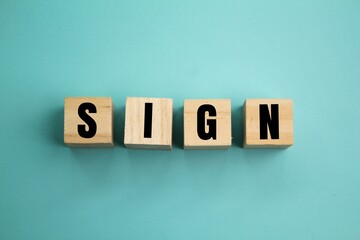 wooden cube with sign word. the concept of a sign or symbol