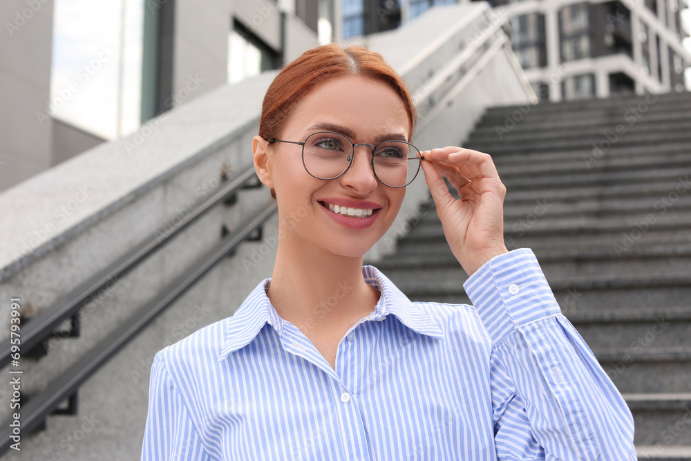 Canvas Prints Portrait of beautiful woman in glasses outdoors