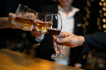 Barman pouring whiskey whiskey glass..
