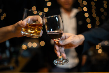 Barman pouring whiskey whiskey glass..