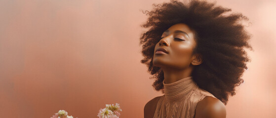 African american woman with afro hairstyle and flowers, panoramic shot