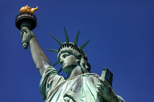 The Statue of Liberty, holding her huge torch in the Big Apple, this monument is known as the lady of New York, a world famous landmark.
