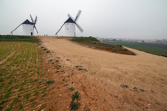 Two windmills in Tembleque. Toledo. Spain. Europe.