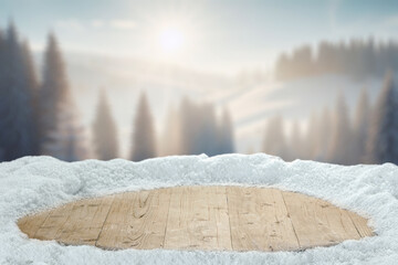Board cover of snow and frost and worn old wooden pedestal. Mockup background space and cold...