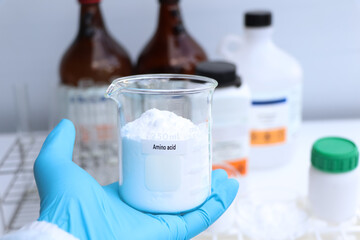 Amino acid powder in chemical container , chemical in the laboratory and industry