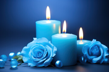 Fototapeta na wymiar blue burning candles with romantic atmosphere