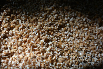 Foodstuffs, cereals, loose cereals, crushed wheat, barley.