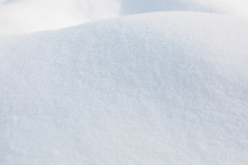Clear white snow as background, closeup. Winter season