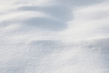 Clear white snow as background, closeup. Winter season