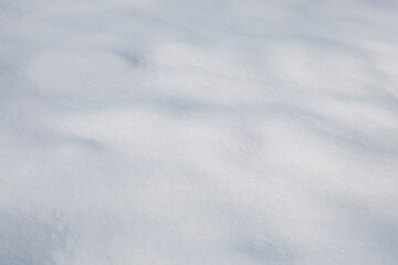 Fototapeta na wymiar Clear white snow as background, closeup. Winter season