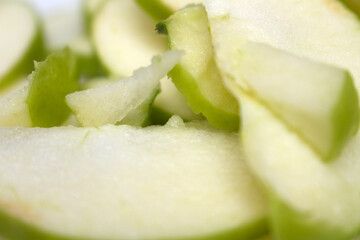 sliced green apple. slices of green apple. fruit details. fruit with selective focus.