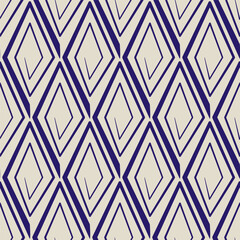 Seamless geometric pattern with rhombuses. Stilized ethnic ornament vector illustration. Blue spirals curl on beige background.