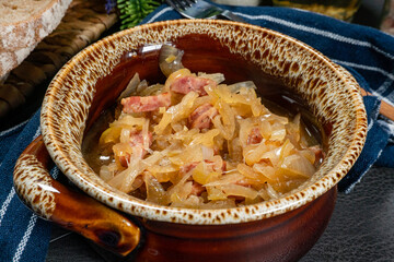 Stewed onion with sausage.