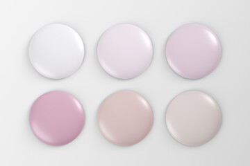 Set of pastel colored glossy round badges or buttons in pink and beige tones for graphic design.