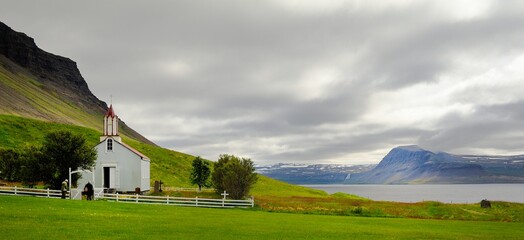Old church above the Icelandic fjord
