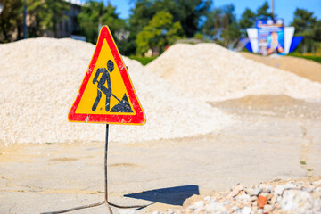 Road sign Repair Work. Background with selective focus and copy space