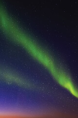 Obraz premium Night blue starry sky and Northern lights. Green aurora borealis