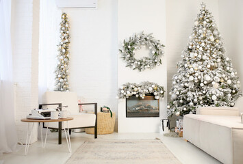 New Year's interior design. Bright room with a Christmas tree decorated with balls and lights, a sofa, a fireplace and an armchair. Home design concept