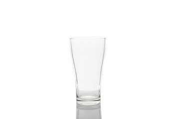 Clear glass for drinks on a white background.