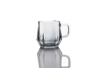 Clear glass for drinks on a white background.