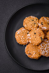 Delicious sweet round sponge cookies sprinkled with coconut flakes