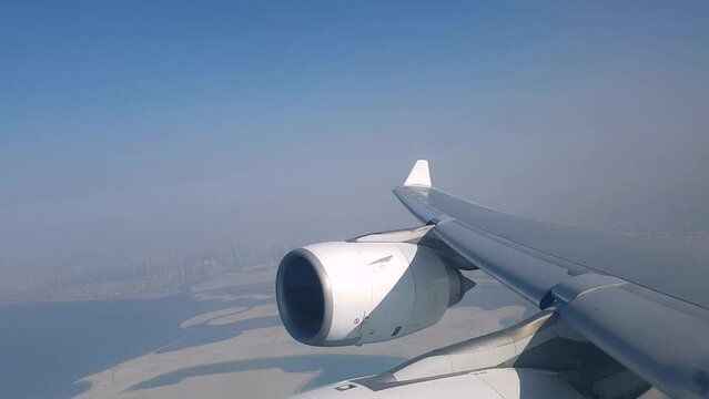 Flying over the city of Dubai and its artificial islands with Airbus A340