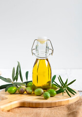 breakfast, olive oil, freshly pressed, olive pressing, oil on bread, olive oil in a glass bottle, on a white background.lined up olives, natural olive harvest, advertising,