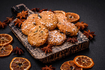 Delicious sweet round sponge cookies sprinkled with coconut flakes