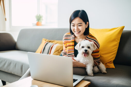 woman with dog and laptop