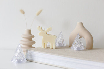 Miracle light candle deer with Christmas trees. White background, copy space. Winter Fairy tale...