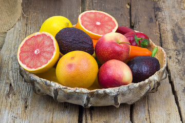 fresh fruits and vegetables in a bowl