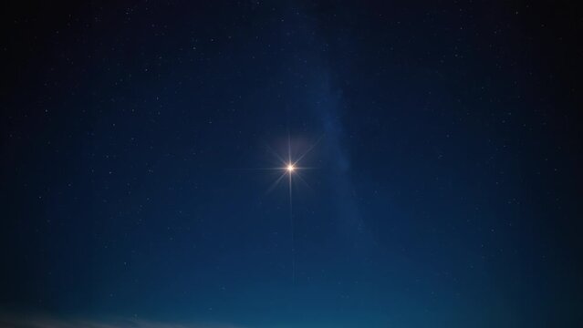 A large Christmas Nativity Star. The star shines over the manger of christmas of Jesus Christ.