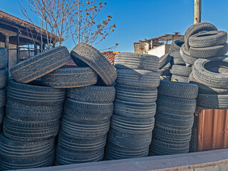 Old tyres from a car tyre shop.