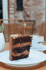slice of chocolate cake served on plate on table