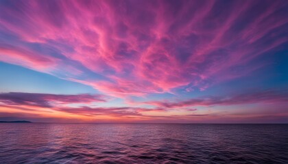 Naklejka na ściany i meble A beautiful sunset over the ocean
