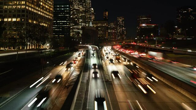 NIght Time Lapse of Los Angeles Downtown Traffic Jam On 110 Freeway 24mm California USA