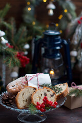 A Christmas cupcake on the background of a Christmas tree with lights. Serving flour products