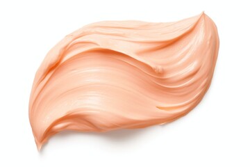Tone bb cream smear swatch isolated on white background. Trendy peach fuzz color.