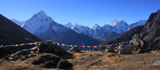 Buddhist prayer flags and Mount Ama Dablam, Nepal.