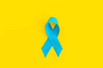 Blue ribbon - colon or prostate cancer awareness concept