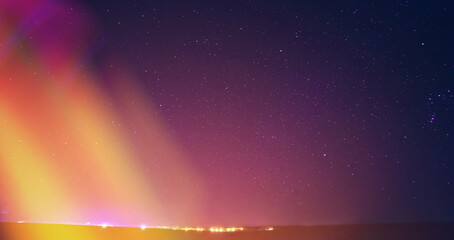 Night Dark Blue Sky Glowing Stars Background Backdrop With Sky Gradient. Colourful Night Starry Sky Gradient. Amazing Night View Sky Above Village. Bright Purple, Yellow And Orange Colors.