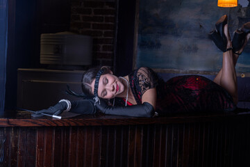 Roaring 20's flappers in basement speakeasy bar