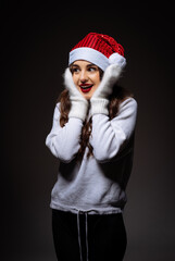 Festive Woman with Santa Hat and Gloves
