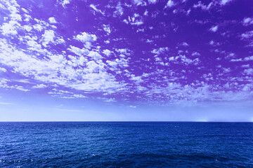 Amazing Beautiful Sunset Sunrise View With Violet Sky. Calm Sea Ocean And Dramatic Sky Background. Very Peri. Bright Purple, Blue, Lavander Colors Of Sky.